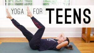 Teenagers practicing yoga together, illustrating a 2026 International Journal of Yoga review on school-based yoga for adolescent mental health