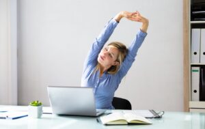 Desk Yoga: 13 Poses For An Energizing Work Stretch Break