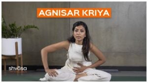 A practitioner demonstrating agnisar kriya, pumping the abdomen during breath retention